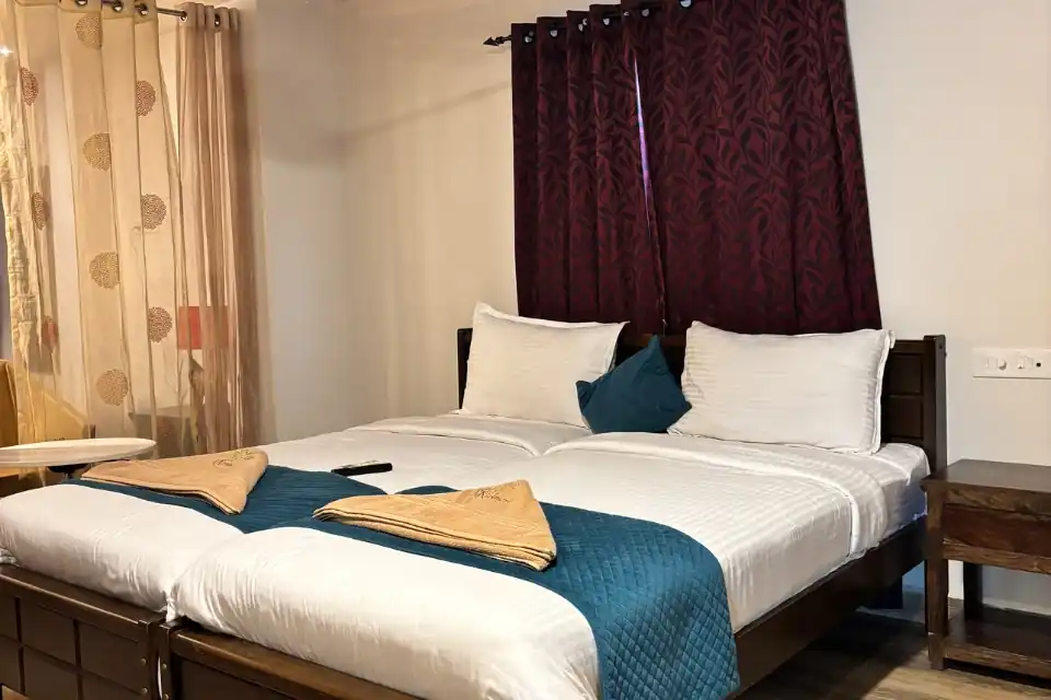 3 star hotels in vizag comfortable minimalistic hotel room with bed pillow and window