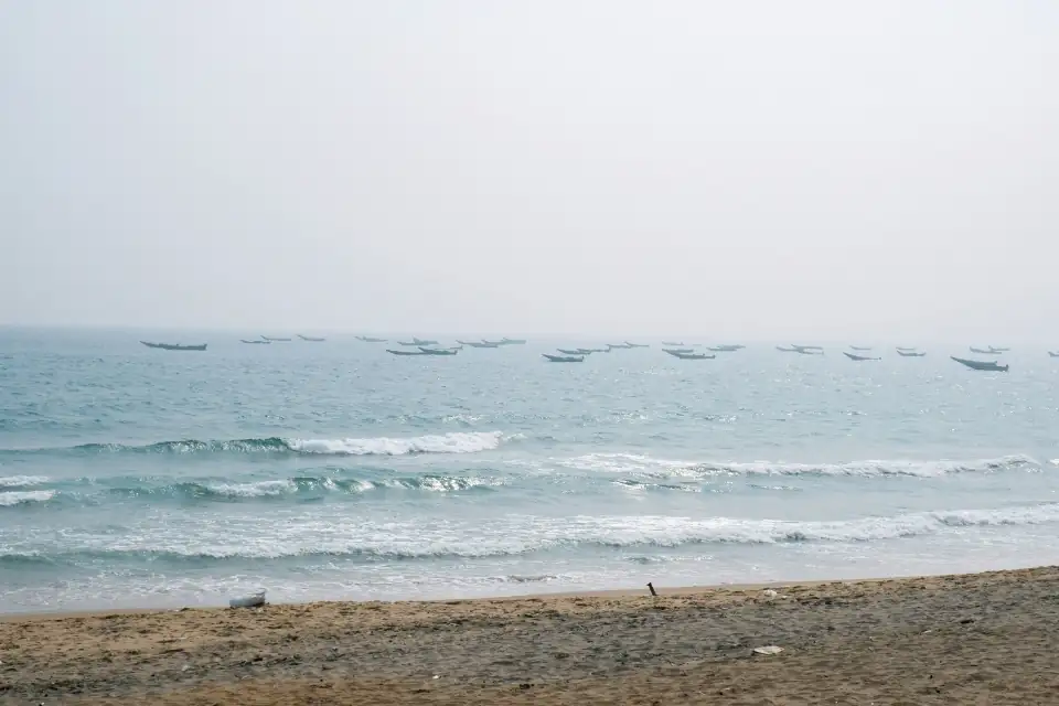 beach view hotels in vizag window view of sea beach with fishing boats in daytime